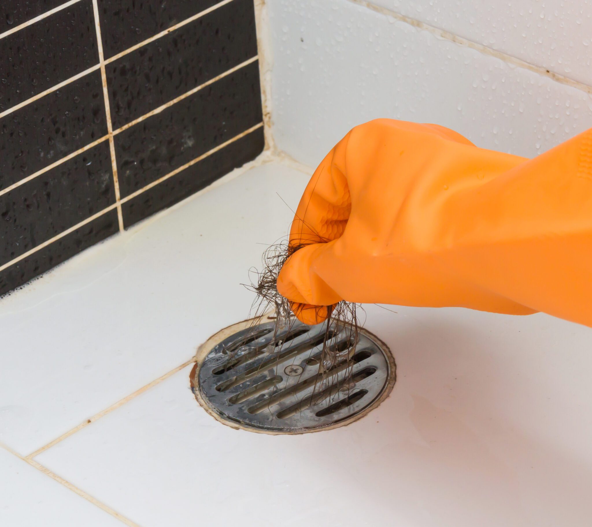 How Do I Know If My Shower Drain Is Clogged? (And How to Fix It!)