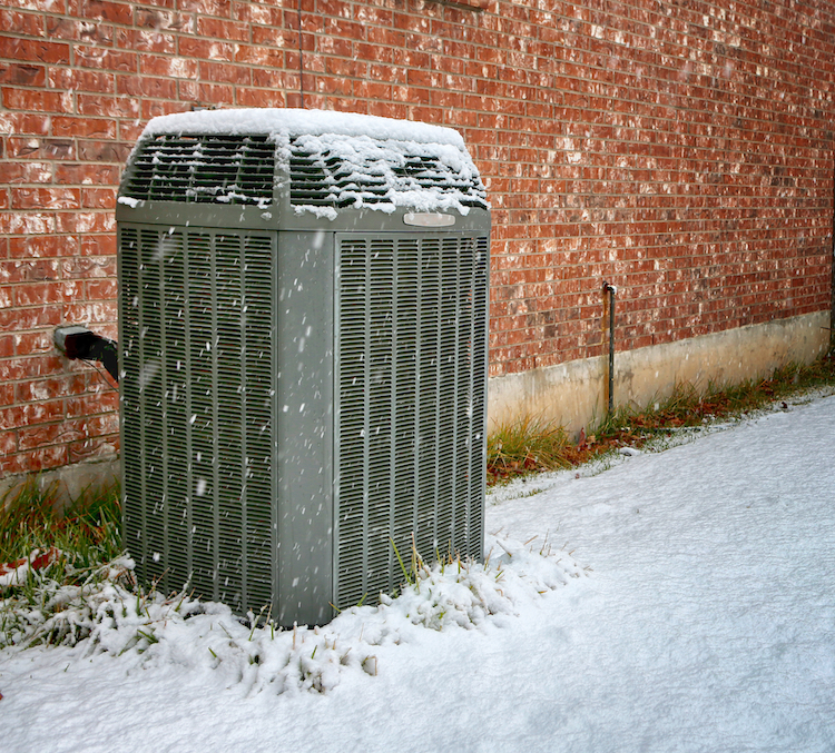 Outside Air Conditioner Unit With Snow | Cates Heating & Cooling
