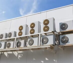 Commercial HVAC systems on a rooftop prepared for scheduled maintenance.