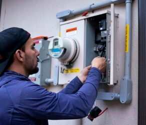 HVAC technician performing HVAC troubleshooting on a furnace